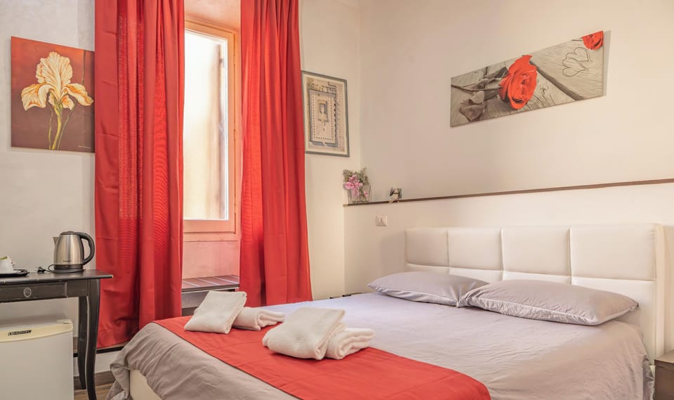 Economy Room | Desk, blackout drapes, free WiFi, bed sheets