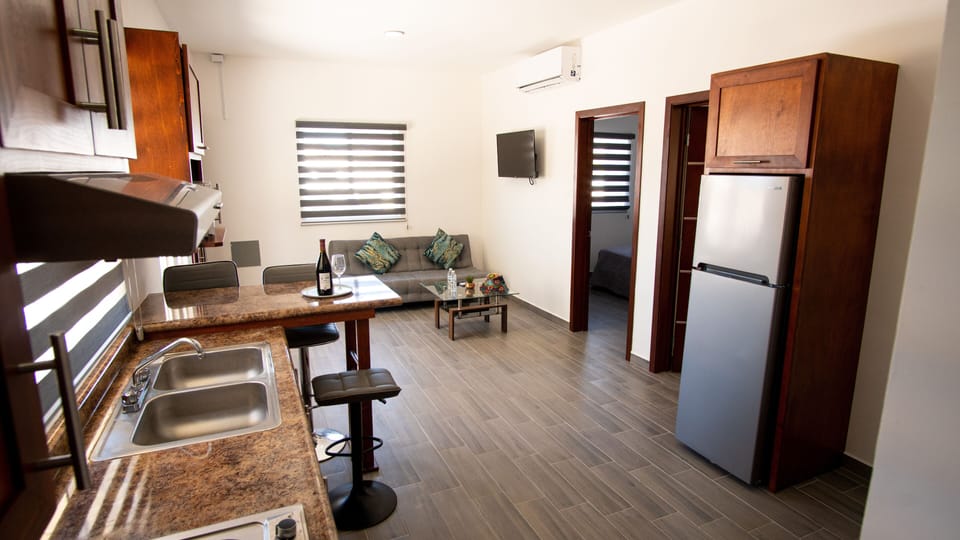 Comfort Condo | Living area | 42-inch LED TV with digital channels, TV