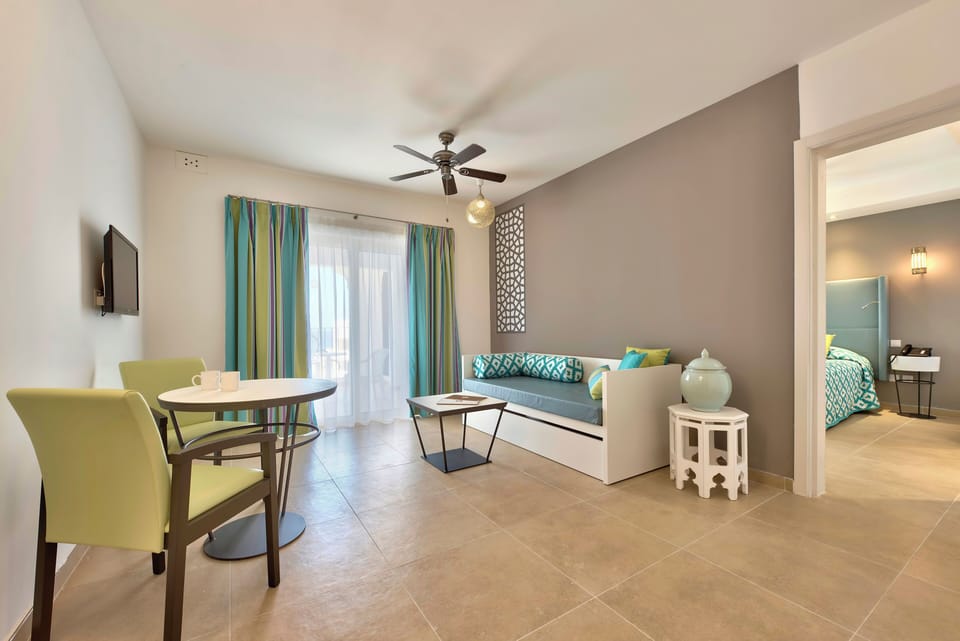 Memory foam beds, minibar, in-room safe, blackout drapes