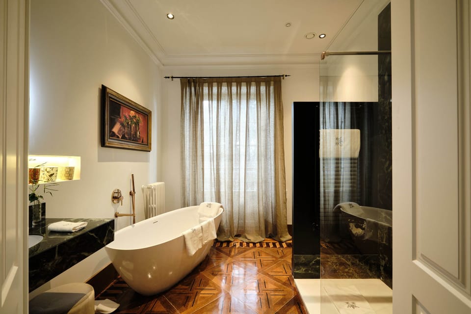 Presidential Room | Bathroom | Designer toiletries, hair dryer, slippers, towels