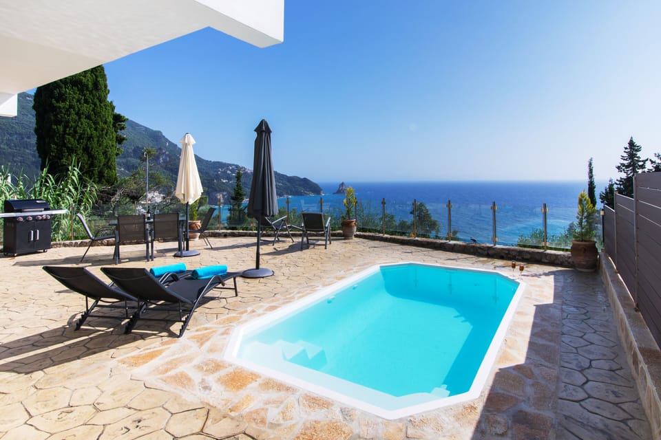 Seasonal outdoor pool, pool umbrellas, sun loungers