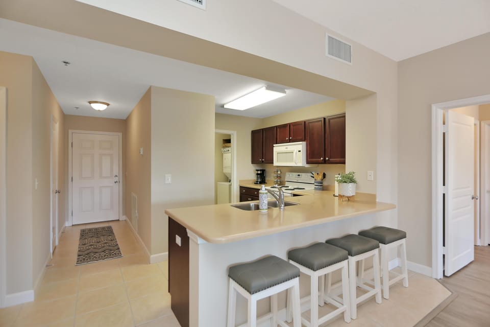 Condo, Multiple Beds (Waterside Village Condo 203) | Private kitchen | Oven, toaster