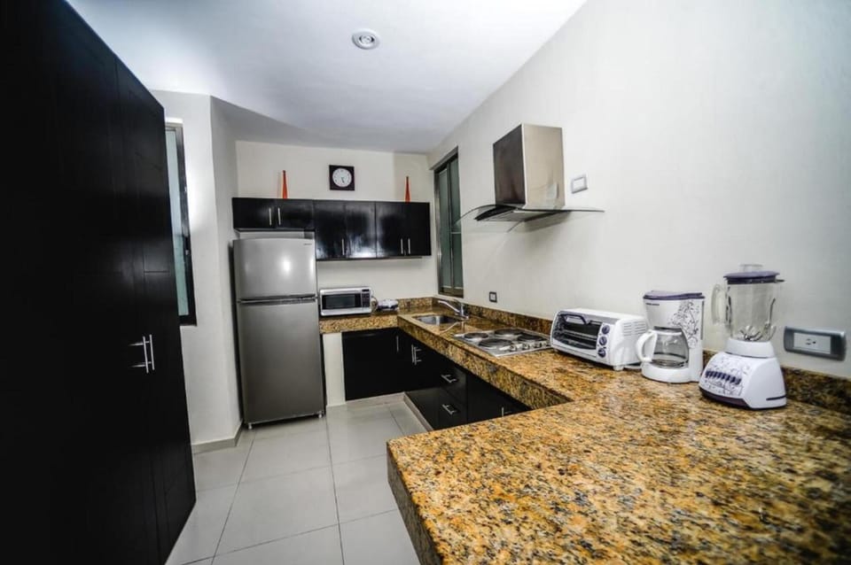 Family Apartment, 2 Bedrooms | Private kitchen | Full-size fridge, microwave, stovetop, coffee/tea maker