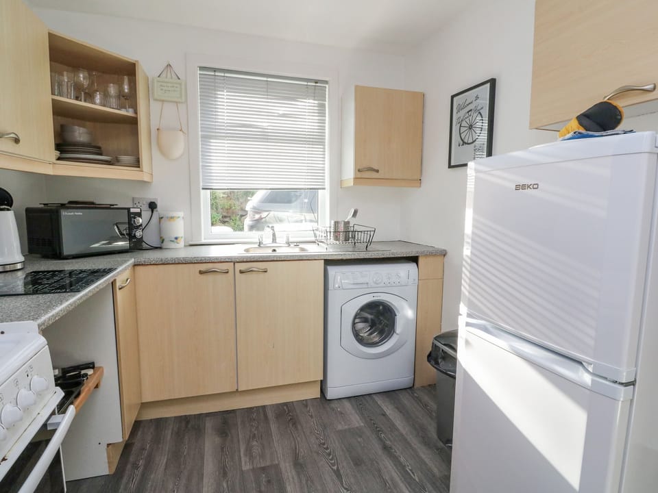Fridge, electric kettle, toaster, cookware/dishes/utensils