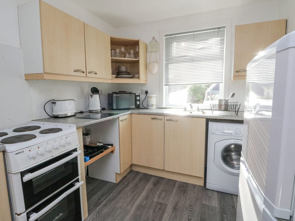 Fridge, electric kettle, toaster, cookware/dishes/utensils