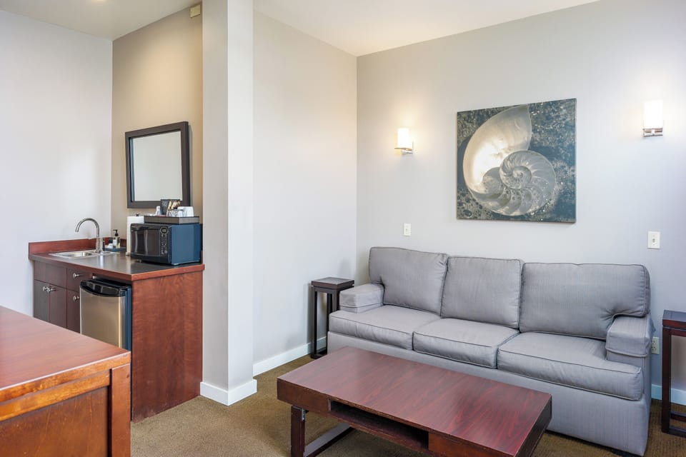 Lopez Suite | Living area | Flat-screen TV