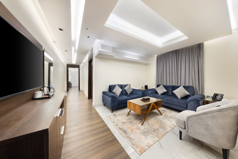 Family Apartment | Living area | Flat-screen TV