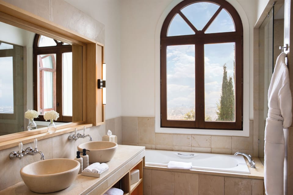 Separate tub and shower, eco-friendly toiletries, hair dryer, bathrobes