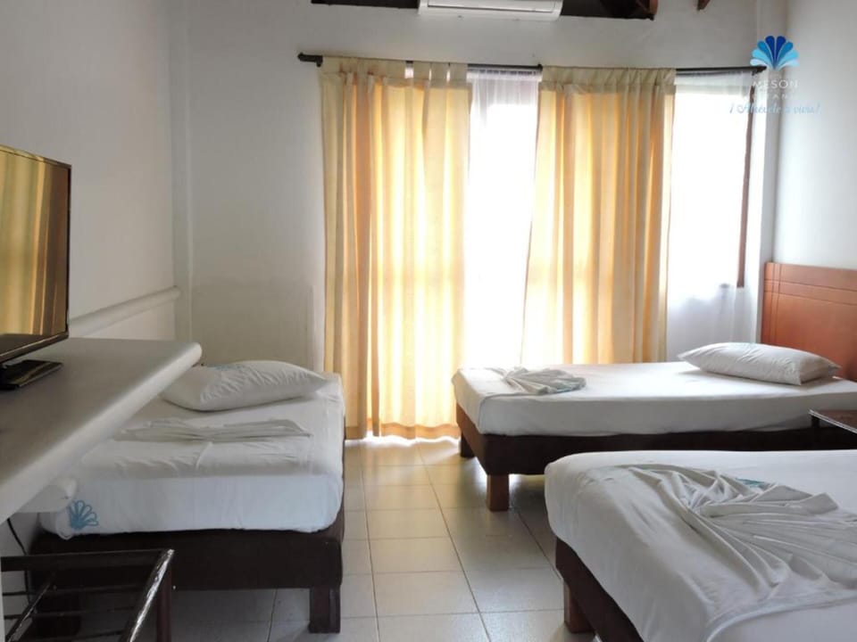 Quadruple Room, Garden View | WiFi (free), bed sheets