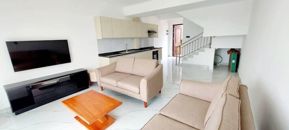 Comfort Room | Living area | 55-inch Smart TV with satellite channels, TV, Netflix