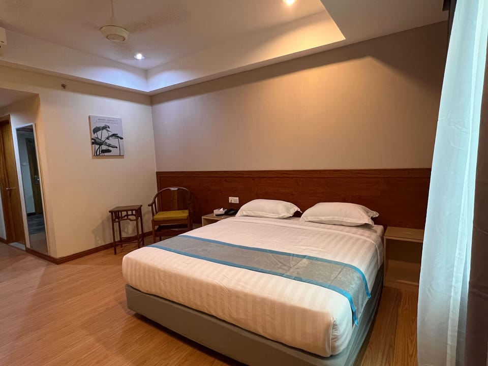 Desk, blackout drapes, iron/ironing board, free WiFi