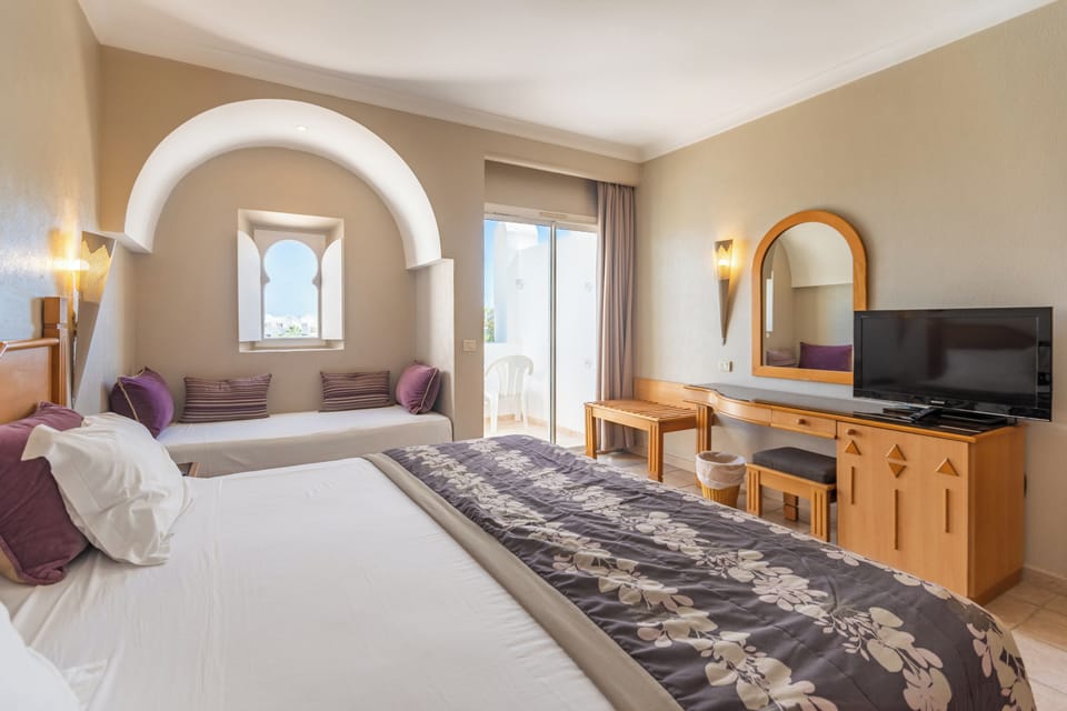 Premium bedding, Select Comfort beds, in-room safe, blackout drapes