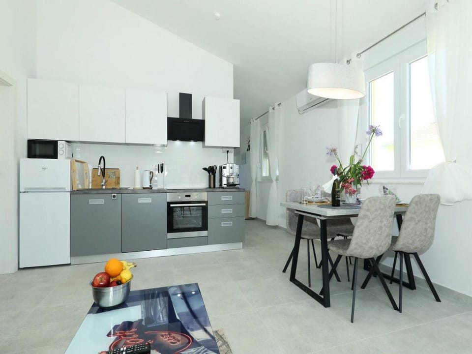 Apartment (One Bedroom Apartment with Balcony) | Private kitchen | Fridge