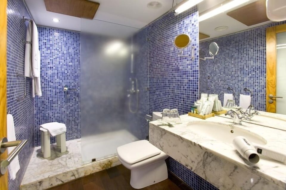 Shower, free toiletries, hair dryer, bathrobes