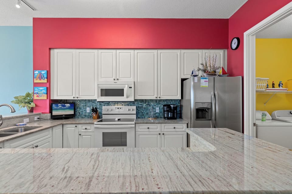 Condo, Multiple Beds, Balcony, Ocean View | Private kitchen | Fridge, microwave, oven, stovetop