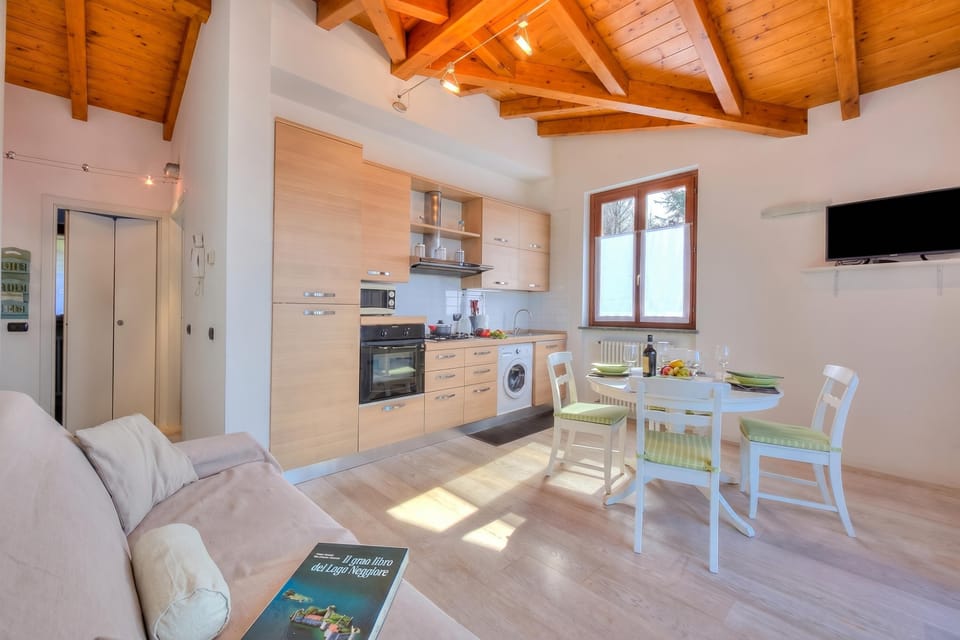 Family Apartment, 1 Bedroom, Balcony, Mountainside (La Brezza Del Lago Maggiore with view) | Living area | TV