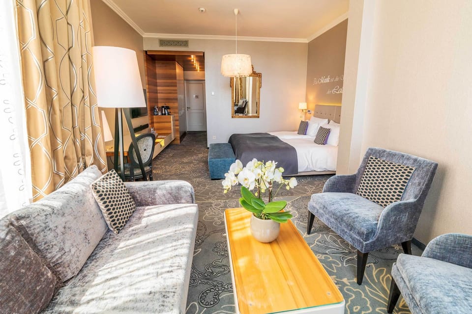 Lifestyle Junior Suite  | Living area | 105-cm flat-screen TV with cable channels, TV, pay movies