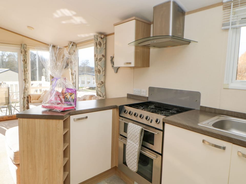 Fridge, electric kettle, toaster, cookware/dishes/utensils