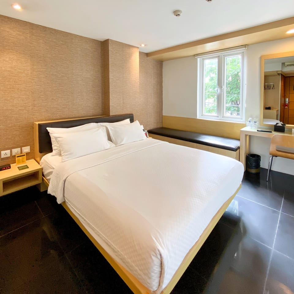 Deluxe Plus | Premium bedding, down comforters, pillowtop beds, in-room safe