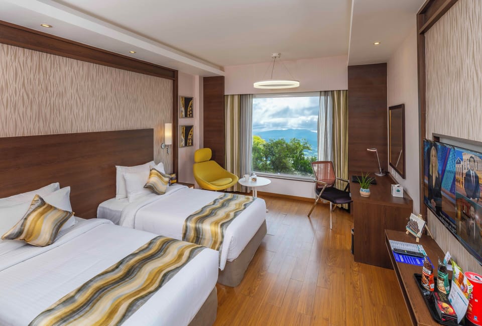 Corporate Room | Premium bedding, minibar, in-room safe, desk