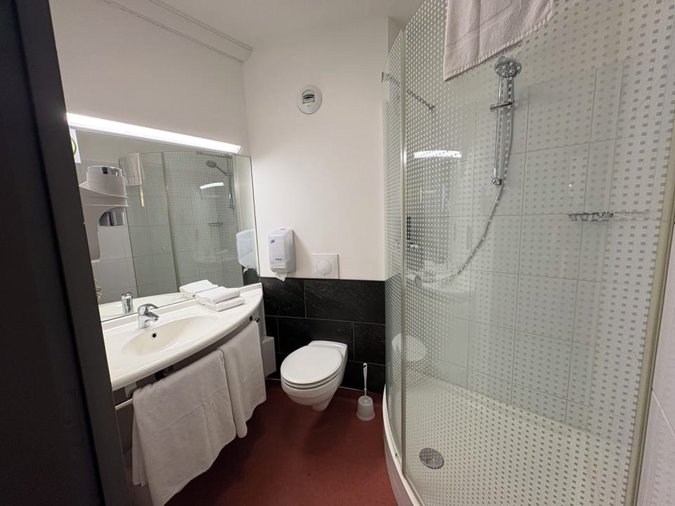 Shower, free toiletries, hair dryer, towels
