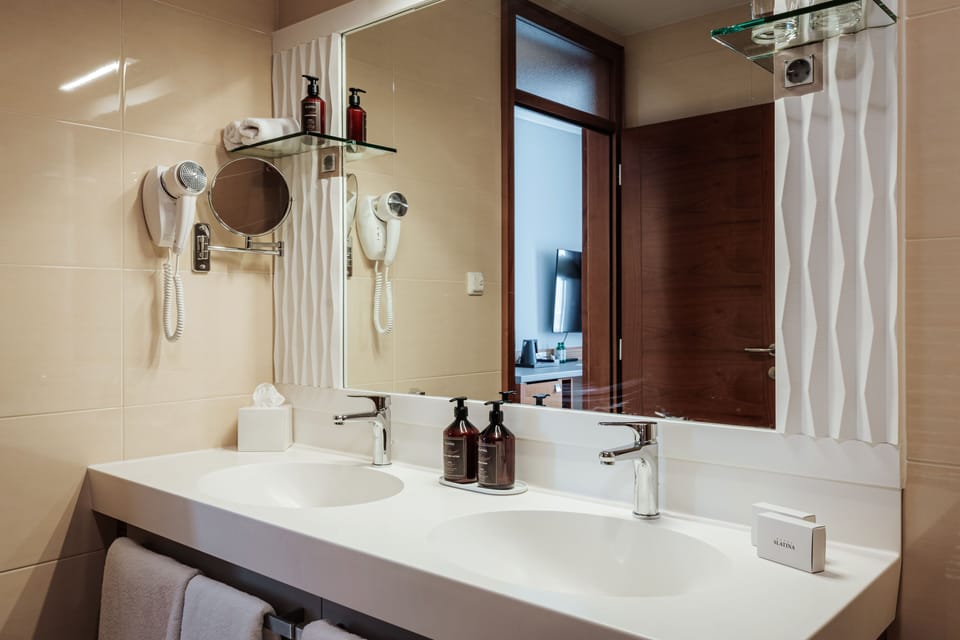 Hair dryer, bathrobes, slippers, towels