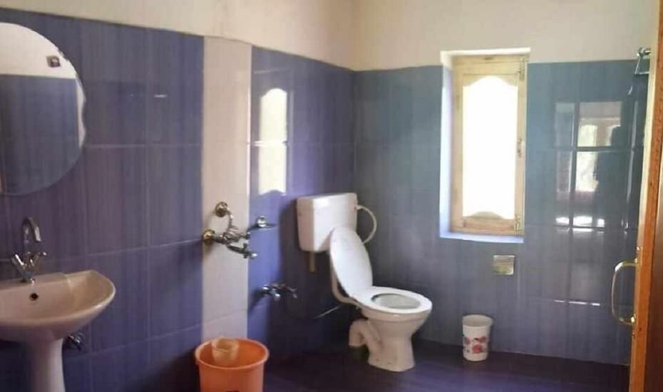 Shower, rainfall showerhead, towels, soap