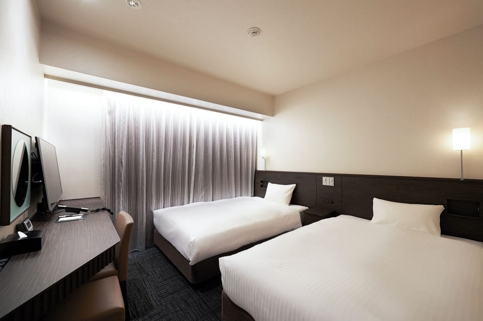 Premium bedding, blackout drapes, free WiFi, bed sheets