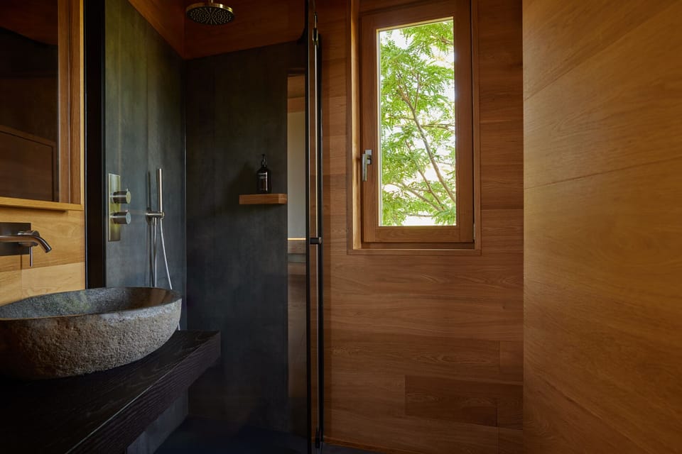 Signature Room, 1 Queen Bed (Suspended House in the Vineyards) | Bathroom | Shower, rainfall showerhead, designer toiletries, hair dryer