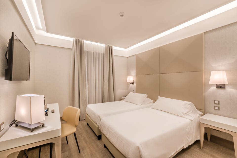 Deluxe Double Room | Down comforters, in-room safe, desk, laptop workspace