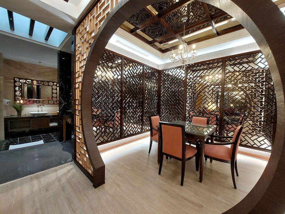 Presidential Double Room (run of house, Check in after 20:00PM) | Living room | 55-inch LED TV with cable channels, TV