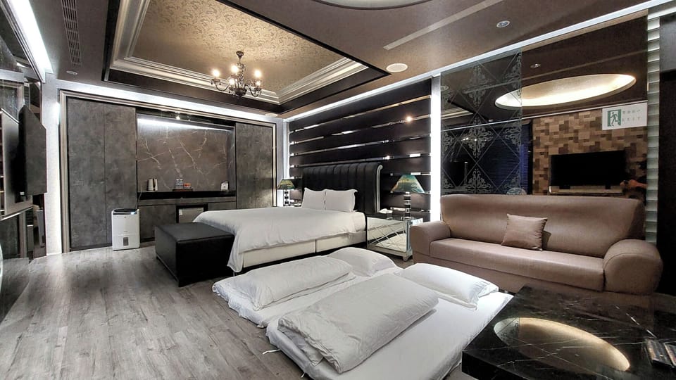 Deluxe Quadruple Room (run of house, Check in after 20:00PM) | Free minibar, free WiFi, bed sheets