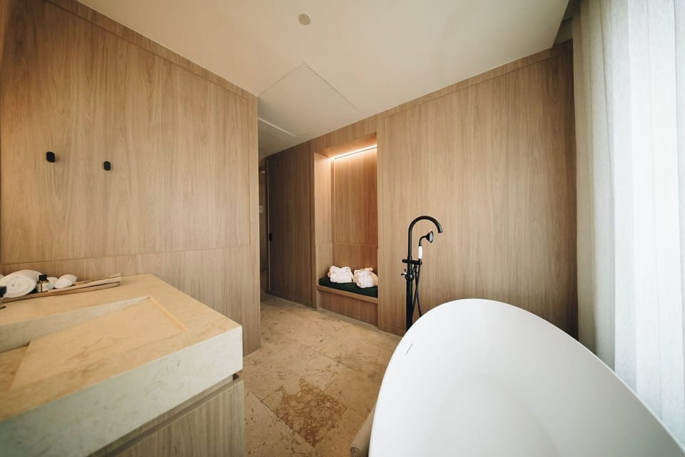 Junior Suite, Bathtub | Bathroom | Free toiletries, hair dryer, towels, soap