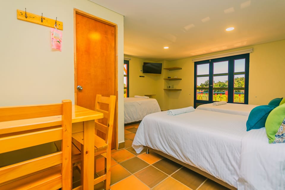 Family Room, Multiple Beds, Balcony, Mountain View | Free WiFi, bed sheets