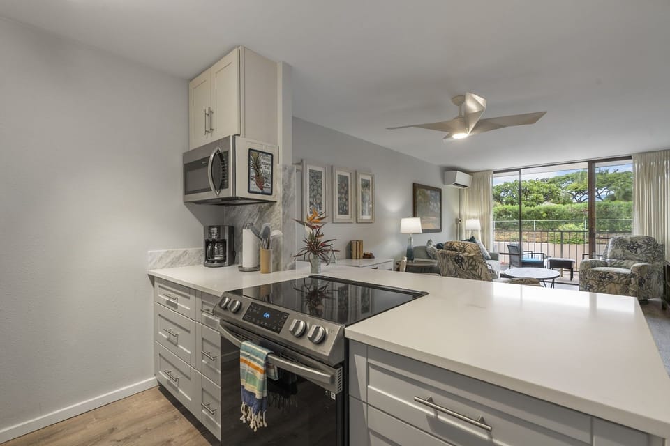 Condo, 2 Bedrooms | Private kitchen | Fridge, oven, dishwasher, coffee/tea maker