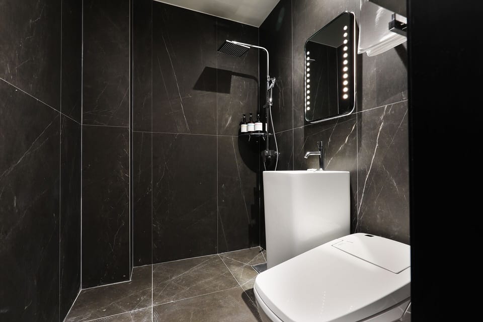 Standard Room | Bathroom | Free toiletries, hair dryer, bathrobes, slippers