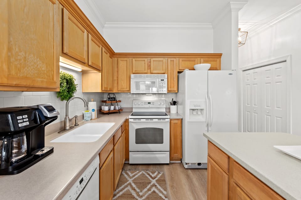 Condo, Multiple Beds, Balcony, Garden View (Seagrove Highlands 1406) | Private kitchen | Fridge, microwave, oven, stovetop