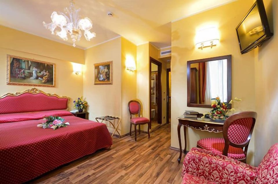 Triple Room | Living area | Flat-screen TV
