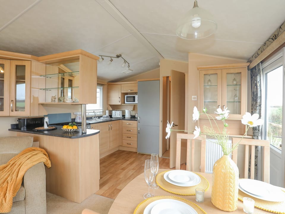 Fridge, electric kettle, toaster, cookware/dishes/utensils