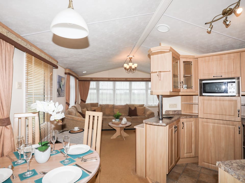 Fridge, electric kettle, toaster, cookware/dishes/utensils