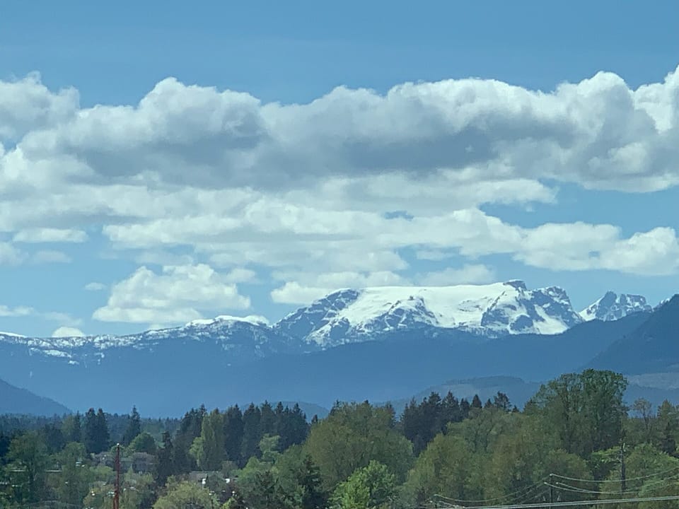 Desk, laptop workspace, blackout drapes, iron/ironing board
