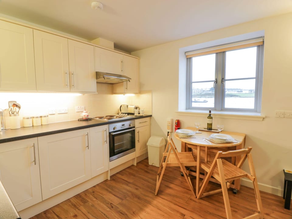 Fridge, electric kettle, toaster, cookware/dishes/utensils