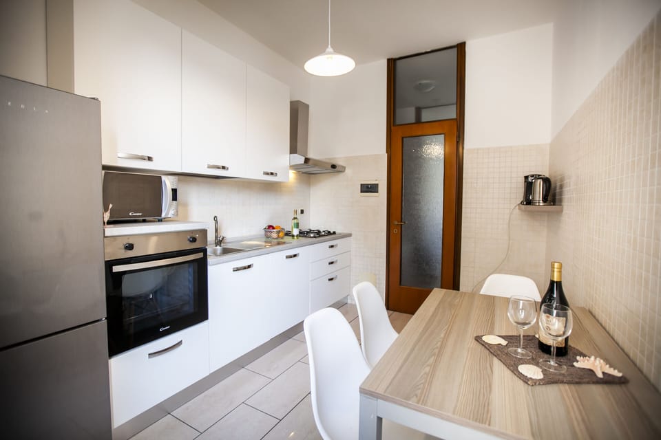 Family Apartment | Private kitchen | Fridge, oven, stovetop, dishwasher