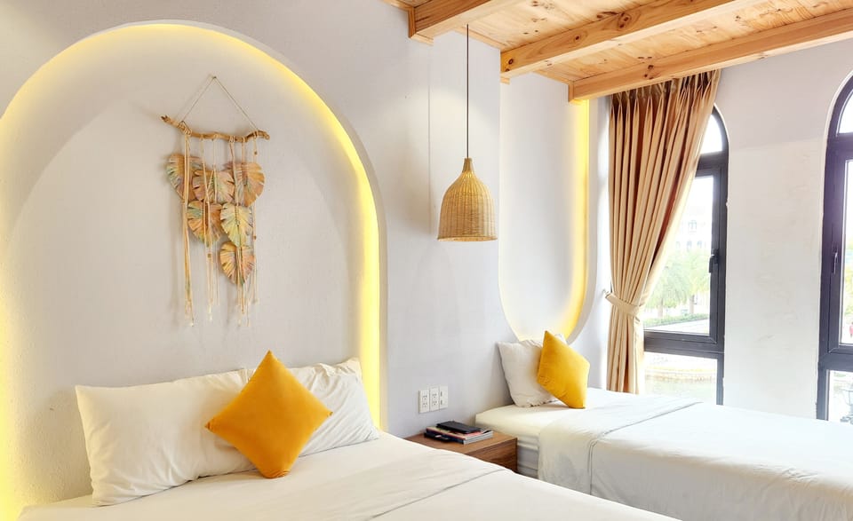 Standard Triple Room, Multiple Beds, Ground Floor | Pillowtop beds, individually decorated, desk, blackout drapes