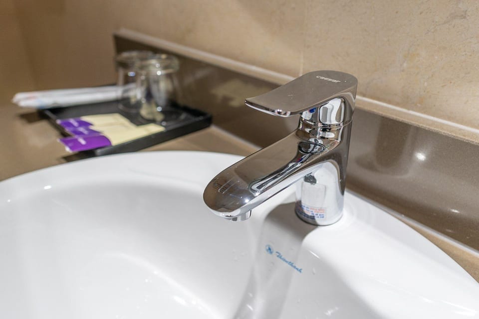 Luxury Apartment | Bathroom | Free toiletries, hair dryer, slippers, towels