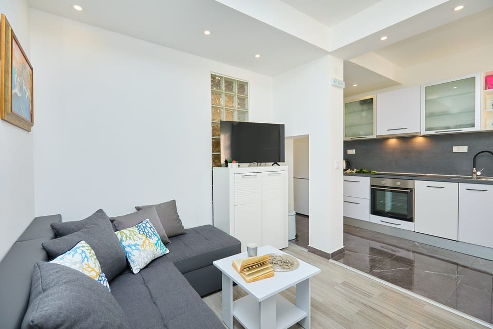 Apartment (One Bedroom Apartment with Terrace) | Living room | 25-inch flat-screen TV with cable channels, TV