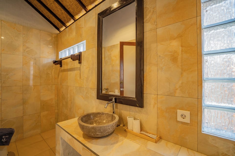 Family Triple Room, Pool View | Bathroom | Shower, rainfall showerhead, free toiletries, hair dryer