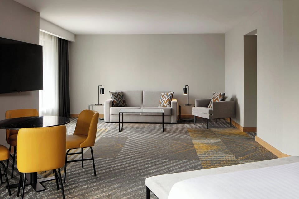 Junior Suite, 1 Bedroom | Living room | LCD TV