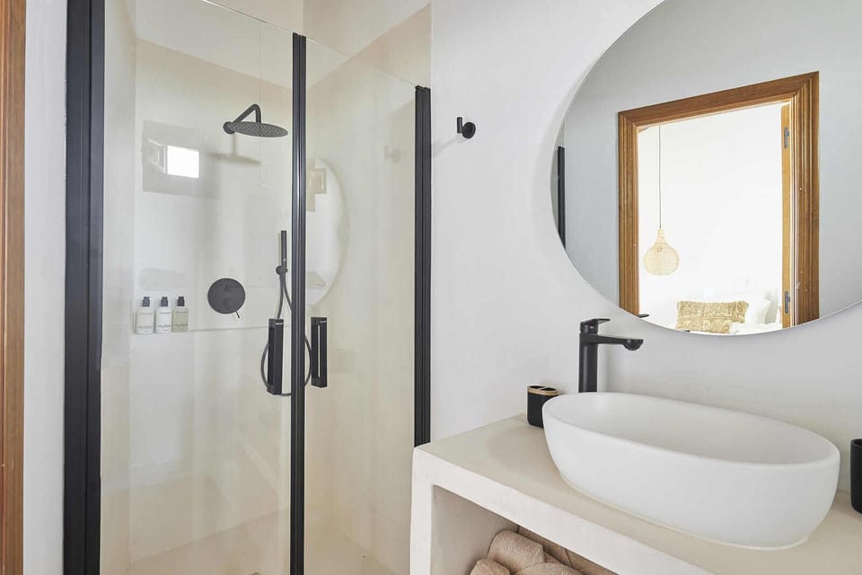 Shower, rainfall showerhead, designer toiletries, hair dryer