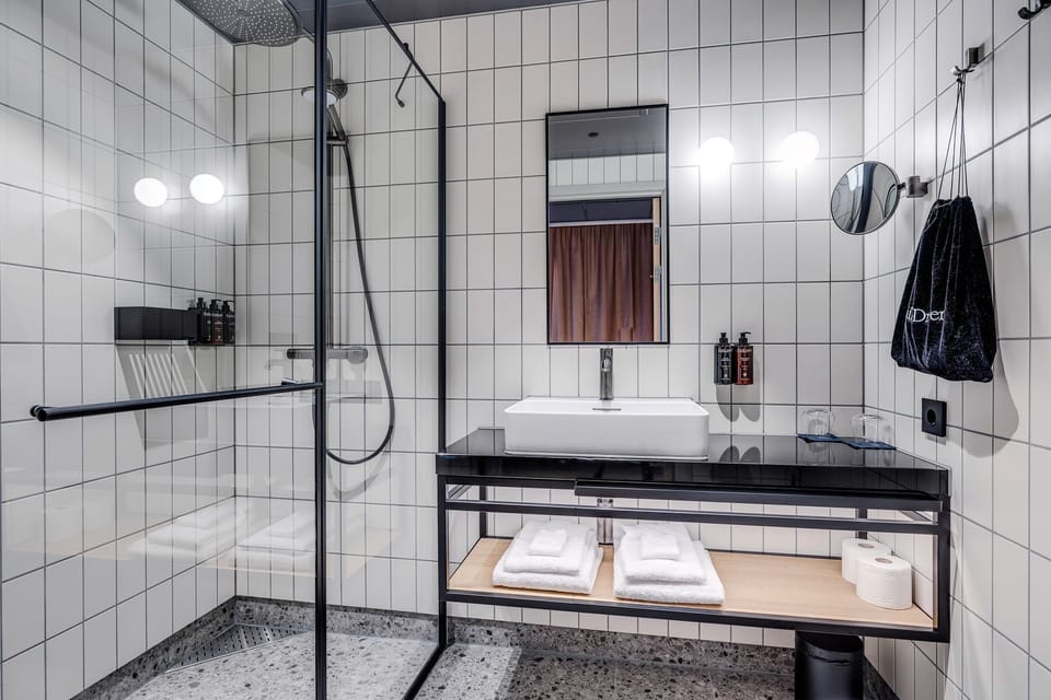 Premium bedding, down comforters, pillowtop beds, minibar